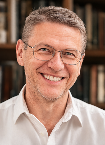 Bild von Erwin Schmaus sitzend im Halbprofil aufgenommen